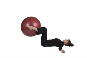 Lying Knee Extensions with Exercise Ball