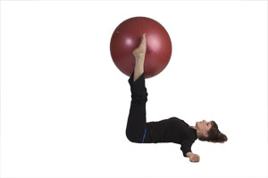 lying_knee_extensions_with_exercise_ball_1.jpg